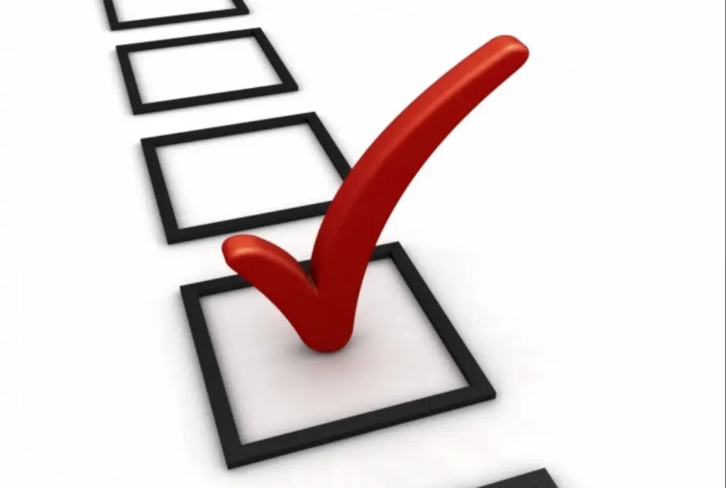 Marca de verificação vermelha em caixa de seleção, simbolizando aprovação ou checklist final para projeto de arte NFT